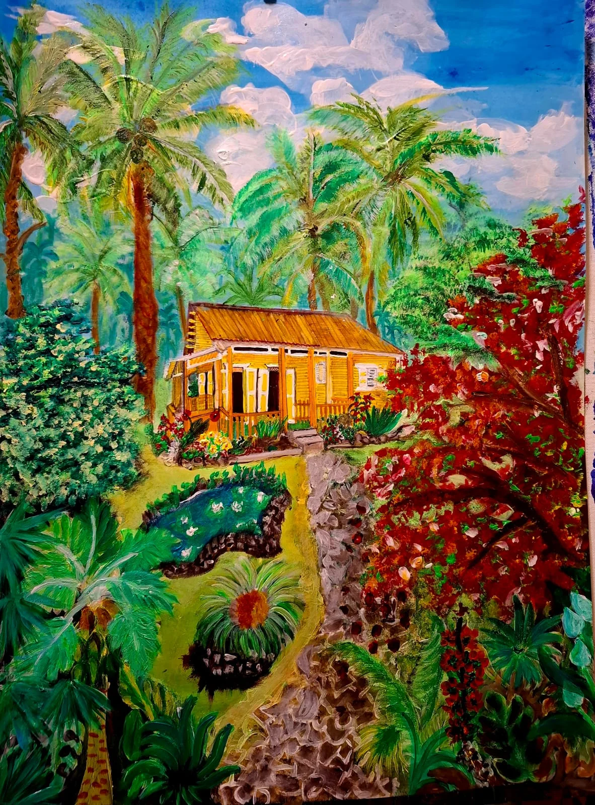 « Le jardin des nénuphares », case créole dans un jardin tropical