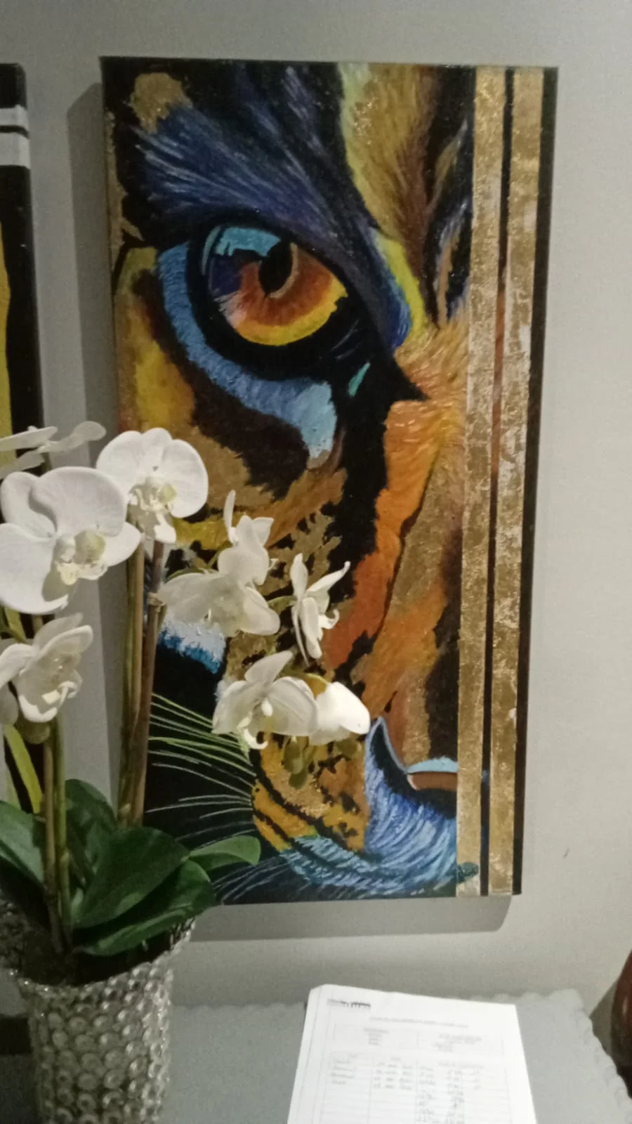 Œil de tigre aux couleurs bleues et orangées